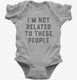 I'm Not Related To These People  Infant Bodysuit