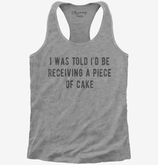 I Was Told I'd Be Receiving A Piece Of Cake Womens Racerback Tank
