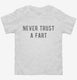 Never Trust A Fart white Toddler Tee