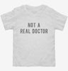 Not A Real Doctor Toddler Shirt F1580104-fa68-4b5f-a8cf-28c6548dc76a 666x695.jpg?v=1700597878