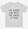 The Boobs Are Real The Smile Is Fake Toddler Shirt 1e648eee-efab-48fc-8fdb-5e77954bcc0c 666x695.jpg?v=1700591242